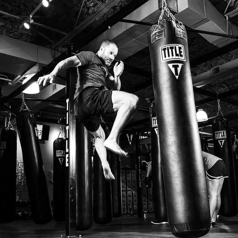 Mixed Martial Arts Lessons for Adults in Clinton Township MI - Flying Knee Black and White MMA